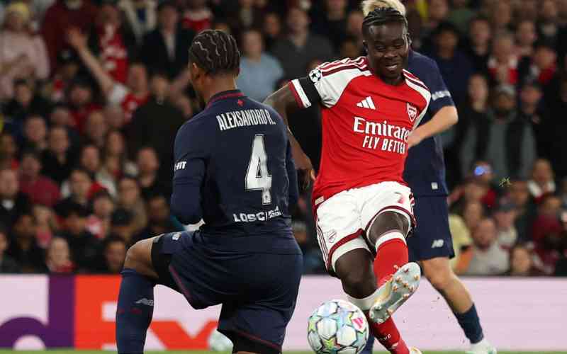 Arsenal cruise past Lille into share of Champions League lead Arsenal cruise past Lille into share of Champions League lead