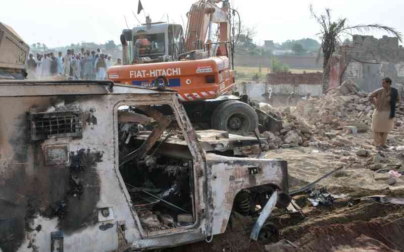 Car bomb attack on checkpoint kills at least 15 in northwest Pakistan: police Car bomb attack on checkpoint kills at least 15 in northwest Pakistan: police