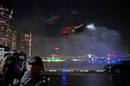 Man charged with shining laser pointer at Trump helicopter