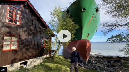 Man in Norway wakes to find huge container ship in garden
