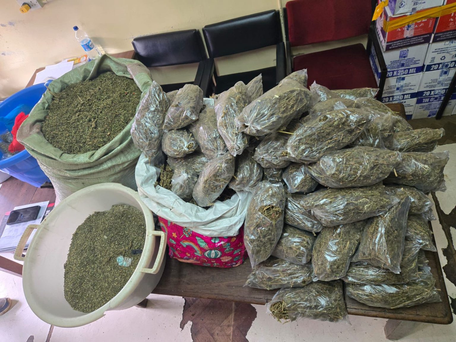 Two suspects arrested as police seize 200kg of cannabis, 100 litres of illicit brew